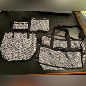 Lesportsac duffle bag, tote bag, makeup bag, and wallet set